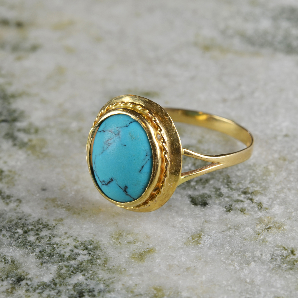 Guldring 18k turkos sten